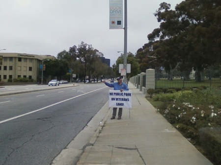 The turned-out-to be Demonic-Back-stabbing Robert Rosebrock carrying sign at one of his Sunday Rally's in May of 2012.